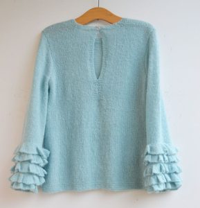 Miętowy pulower / sweter z falbankami